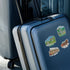 Navy hardshell suitcase with glossy St. Louis stickers: Grant's Farm, Clydesdale horses and the Loop trolley car.