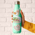 A hand holding a mint green insulated water bottle with a stainless steel cap. The bottle features three colorful Panama travel-themed illustrations on the front, including a Ceviche, a beach hut labeled 'San Blas Islands (Guna Yala)', and a couple in Panaman cultural dress.