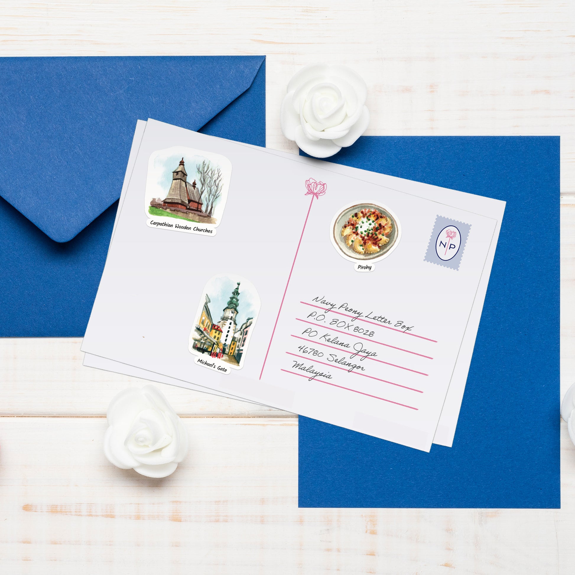Carpathian wooden church, pirohy and Michael's Gate stickers on a handwritten postcard