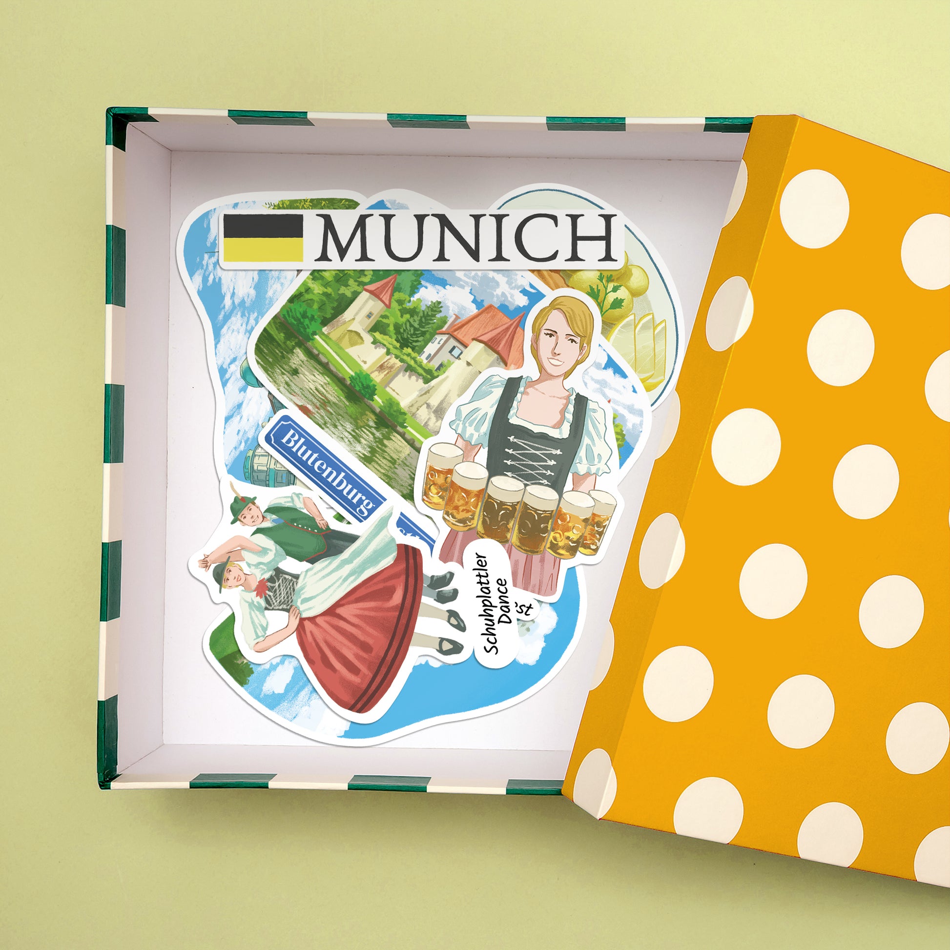 MUNICH, Blutenburg Castle and Oktoberfest server stickers inside an open polka-dot gift box
