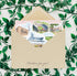 Alabama landmark stickers tucked in a kraft envelope framed by green leaves