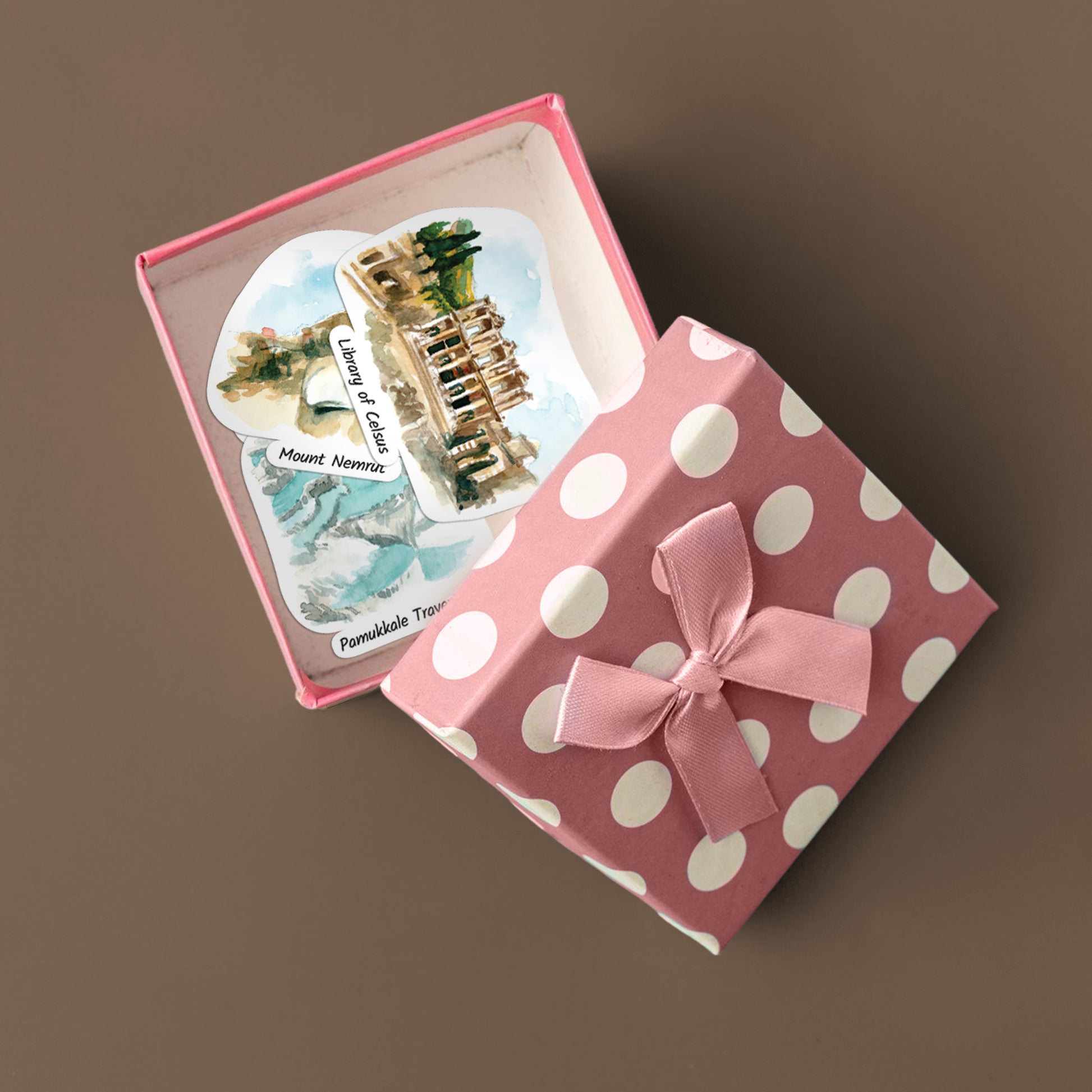 Library of Celsus, Mount Nemrut and Pamukkale stickers in an open pink polka-dot gift box