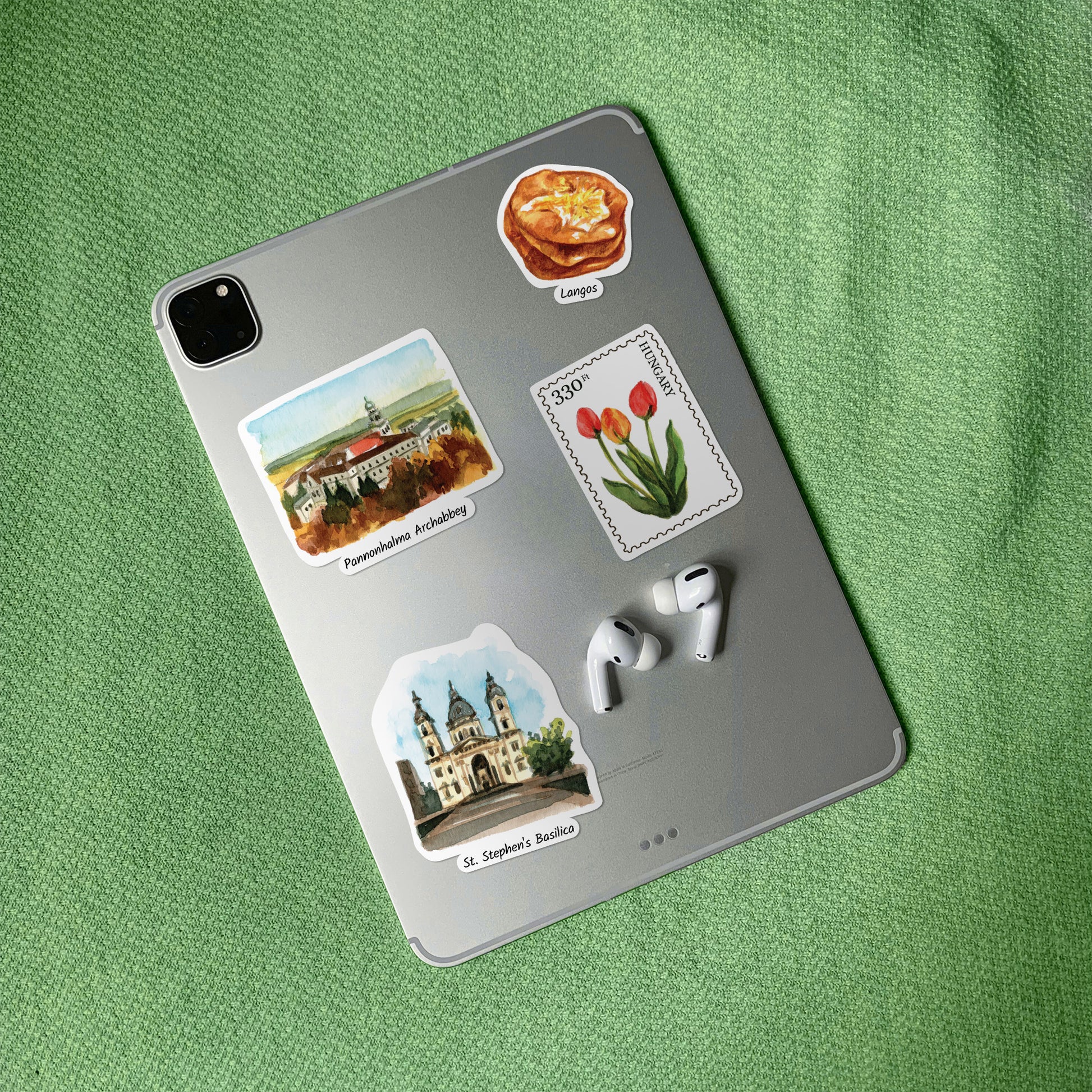 Langos, tulip stamp, Pannonhalma Archabbey and St Stephen's Basilica stickers on a grey tablet back