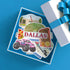 A set of die-cut Dallas-themed stickers arranged inside an open blue gift box, with a white box and blue ribbon partially visible at the top right on a bright blue background.