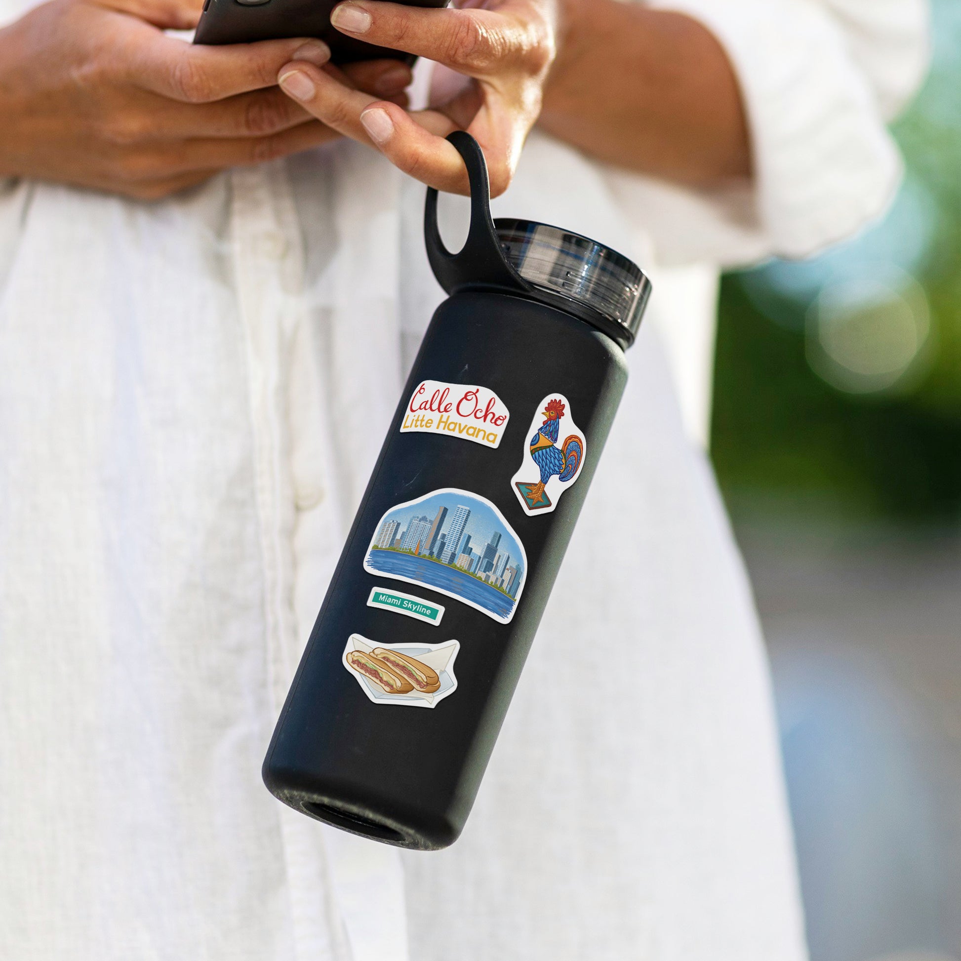 Calle Ocho Little Havana, Miami Skyline and Cuban sandwich stickers on a black water bottle