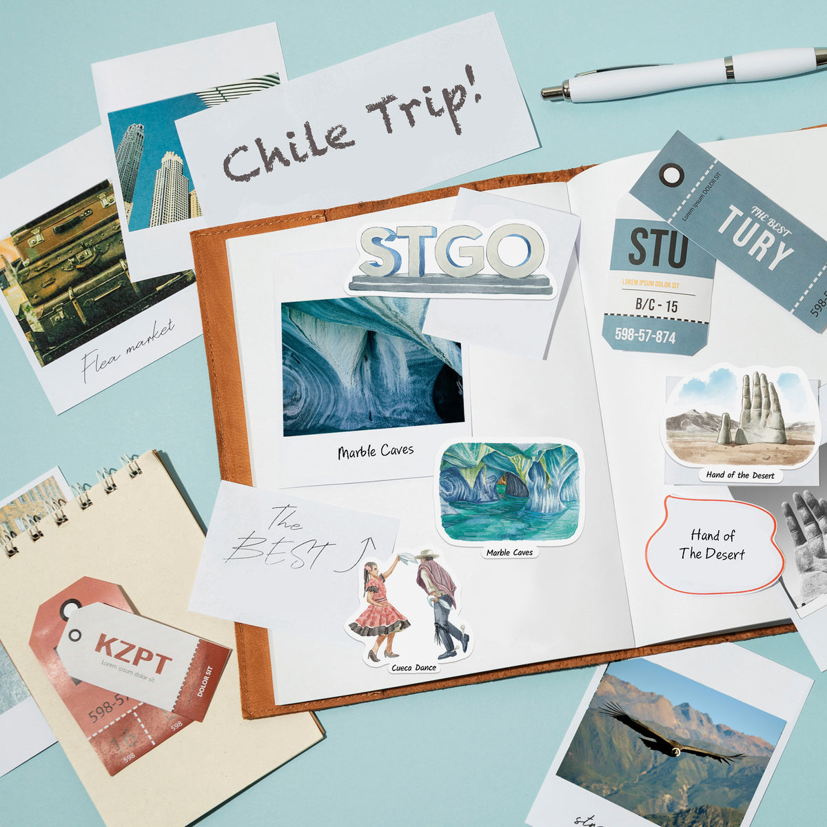 A styled flat-lay of a scrapbook or journal page featuring travel-themed cutouts and printed cards, including a large 'Chile Trip!' note, a ticket stub, a 'STGO' stamp, and small travel photos, arranged on a light blue background with a pen nearby.